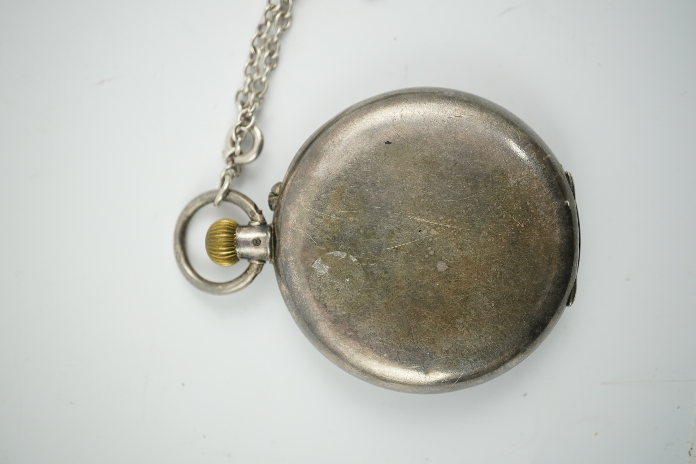 A George V silver open farce keyless pocket watch, by S. Smith & Son, with two subsidiary dials, case diameter 45mm, with a sterling chain. Condition - poor